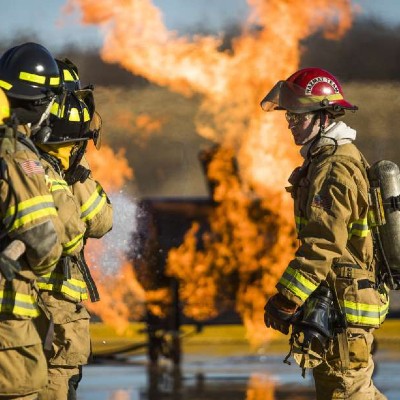 fire, firefighters in foreground